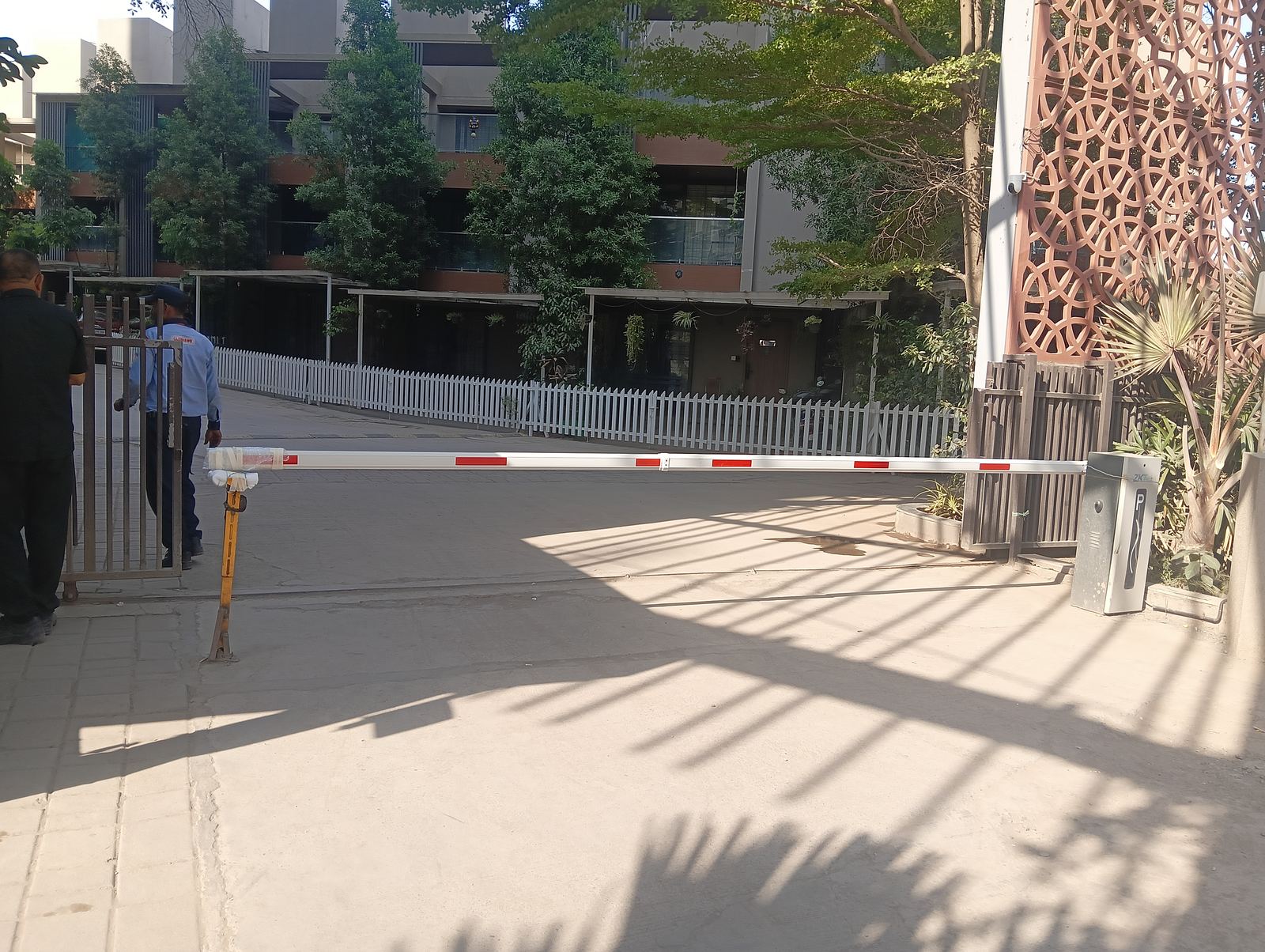 Automated boom barrier at a residential society entrance in Pune